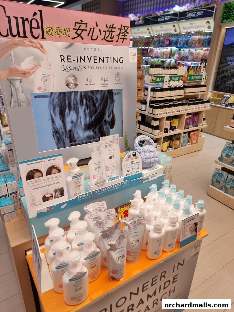 A display of Curél shampoo and conditioner products for sensitive scalps.