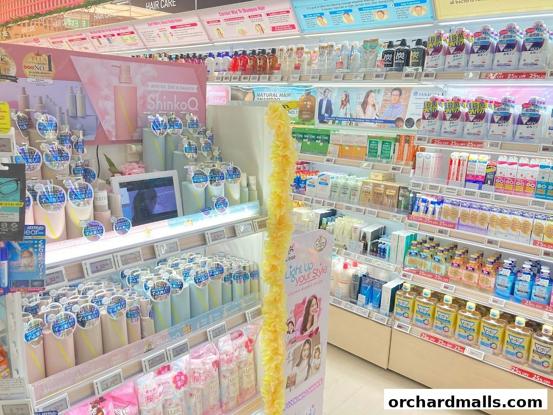 A well-stocked retail display featuring hair care products and cosmetics.