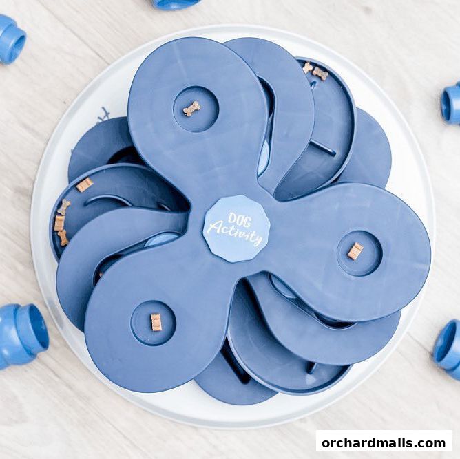 A blue dog activity puzzle toy with treats scattered around it.