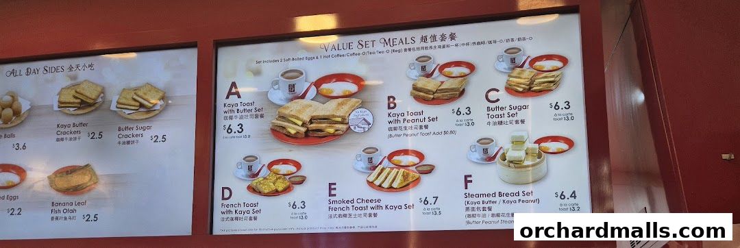 A menu board displaying various value set meals and all-day sides from Ya Kun Kaya Toast.