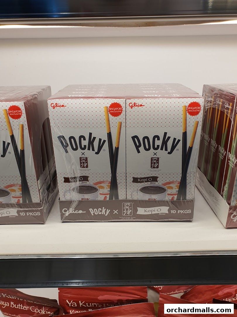 Boxes of Glico Pocky Kopi O flavour, a Singapore exclusive, are displayed on a shelf.