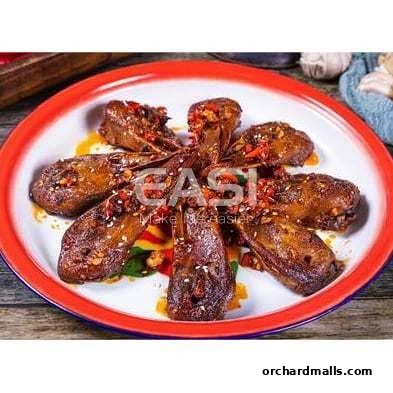 A plate of delicious braised duck heads with chili and spices.