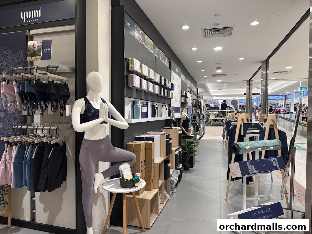 Interior view of Yumi Active store showcasing yoga apparel and accessories.