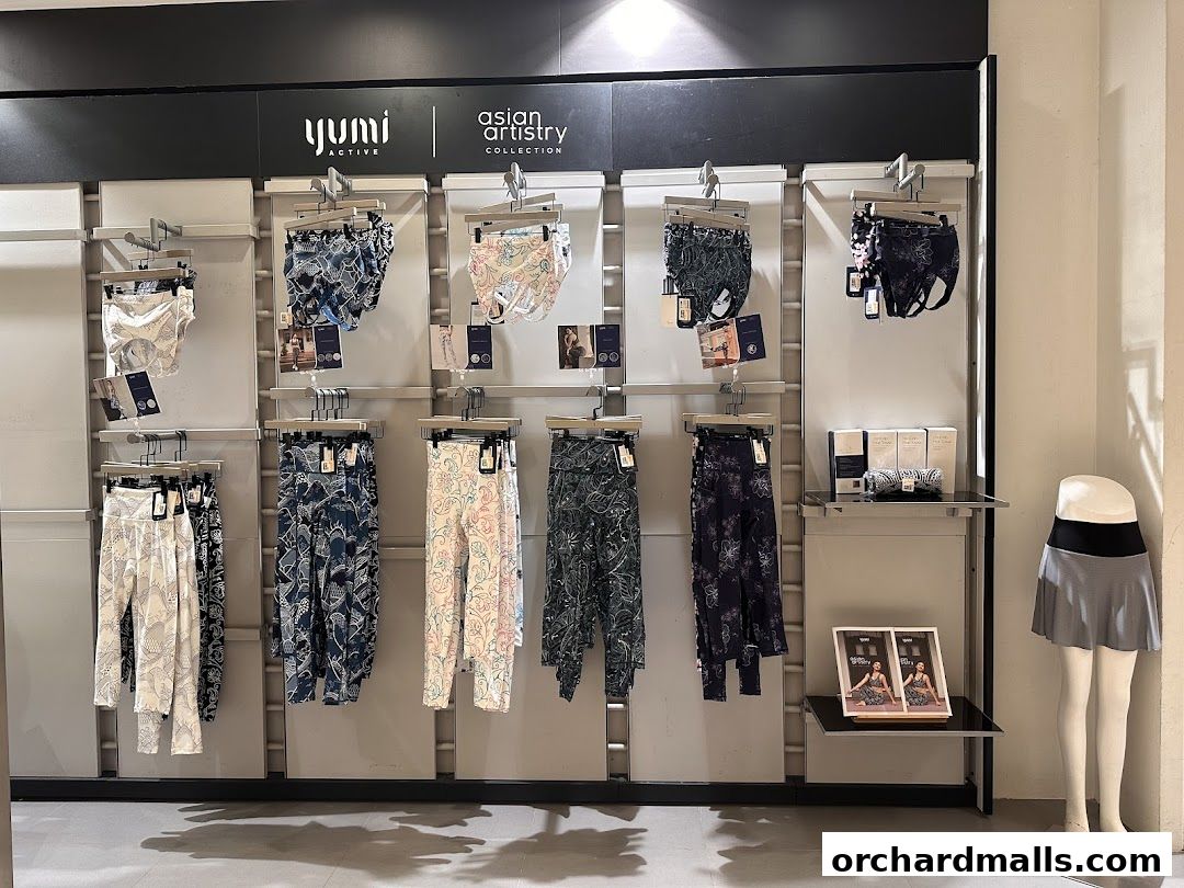 Yumi Active store display featuring activewear with Asian-inspired prints.