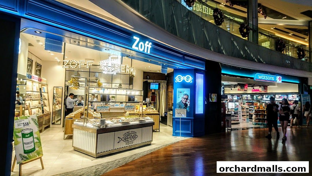 The Zoff eyewear store entrance with displays of glasses and a promotional sign.