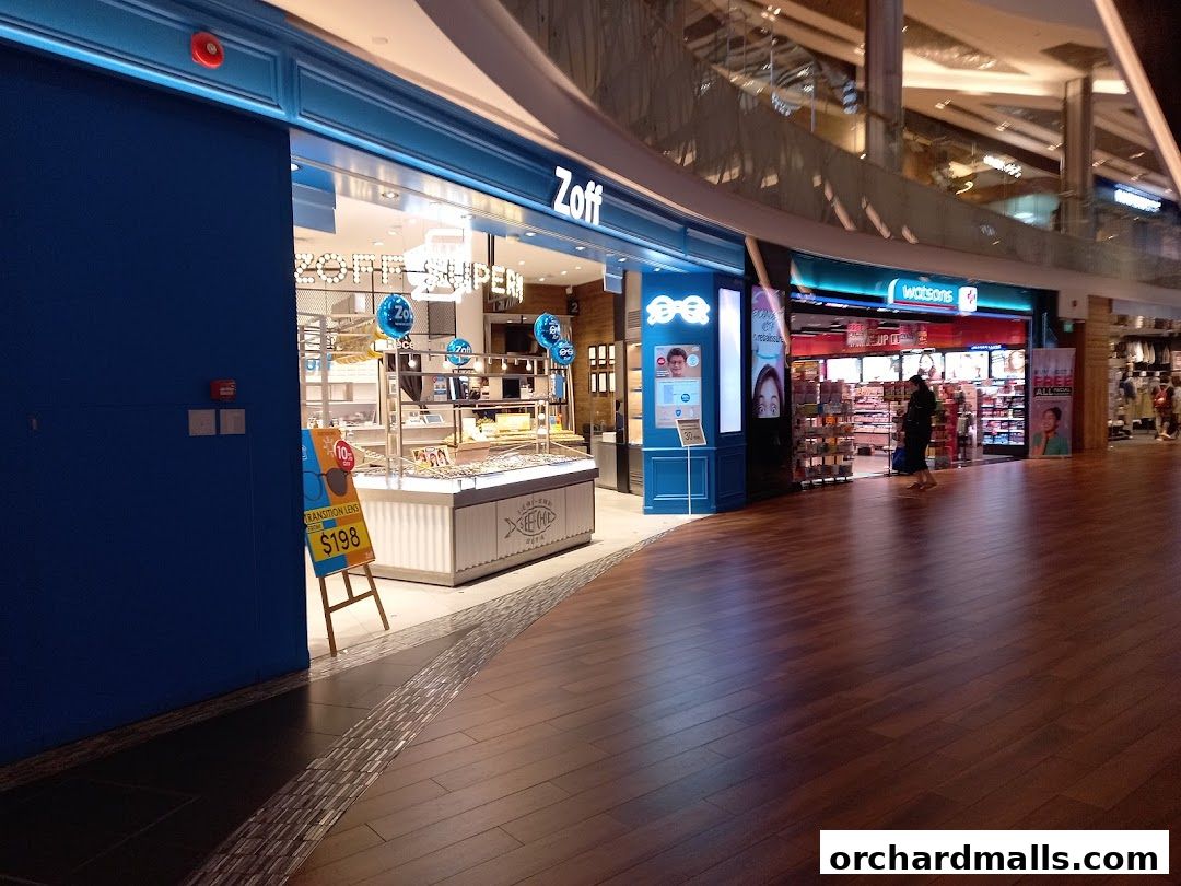 The Zoff optical shop entrance with displays of glasses and promotional signage.