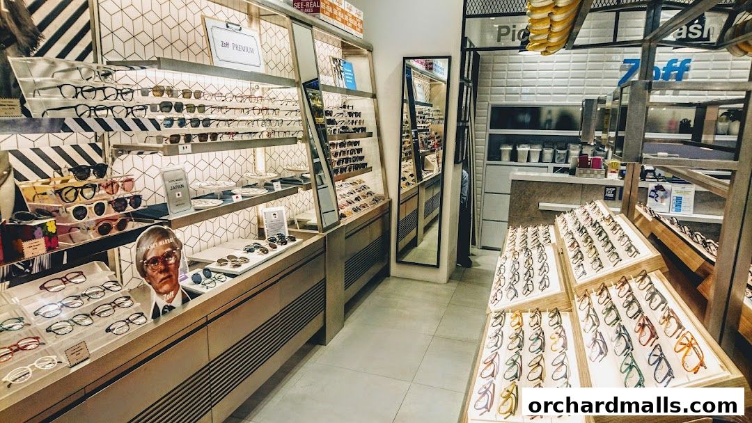 Interior view of a Zoff optical shop showcasing a wide selection of eyeglasses and sunglasses.