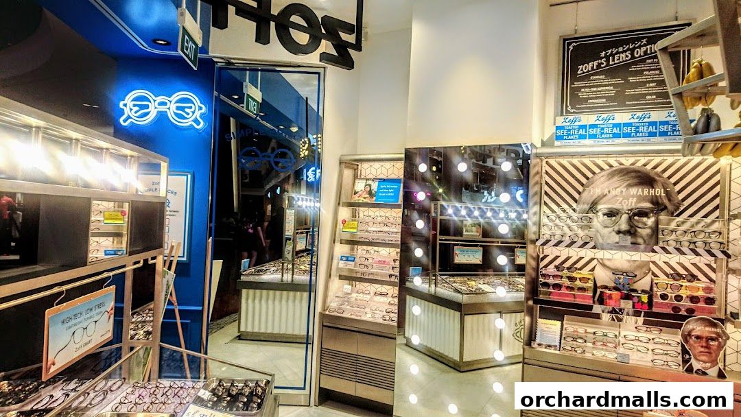Interior view of a Zoff optical shop showcasing various eyeglasses and promotional displays.