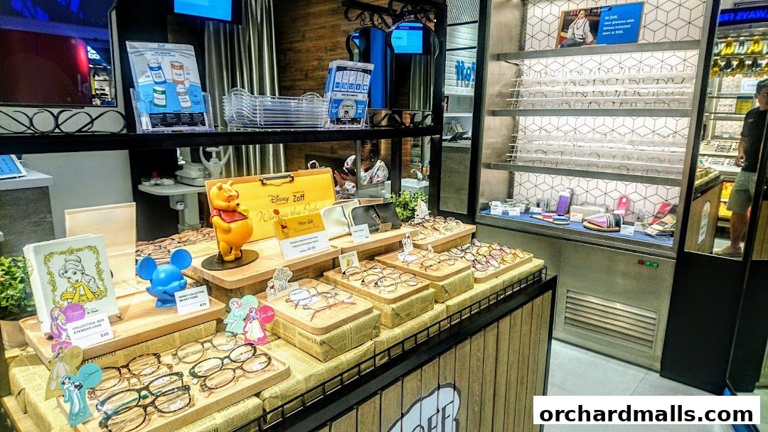 A display of Disney-themed eyeglasses and accessories at Zoff ION Orchard.