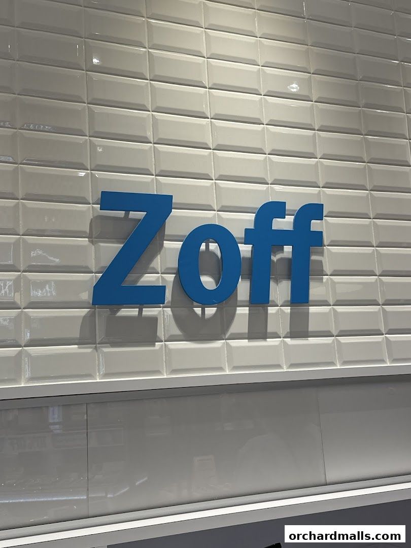 The Zoff logo is displayed in blue against a white subway tile wall.