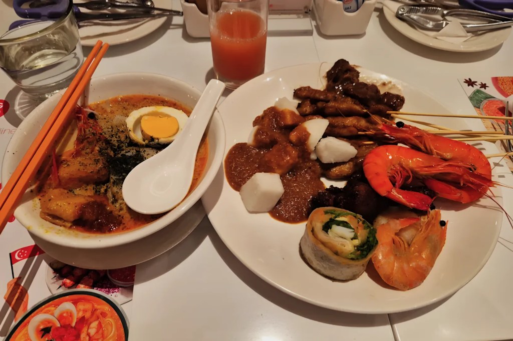 Laksa with satay and prawns at The Line Shangri-La Singapore